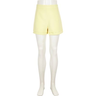 Girls light yellow high waisted shorts